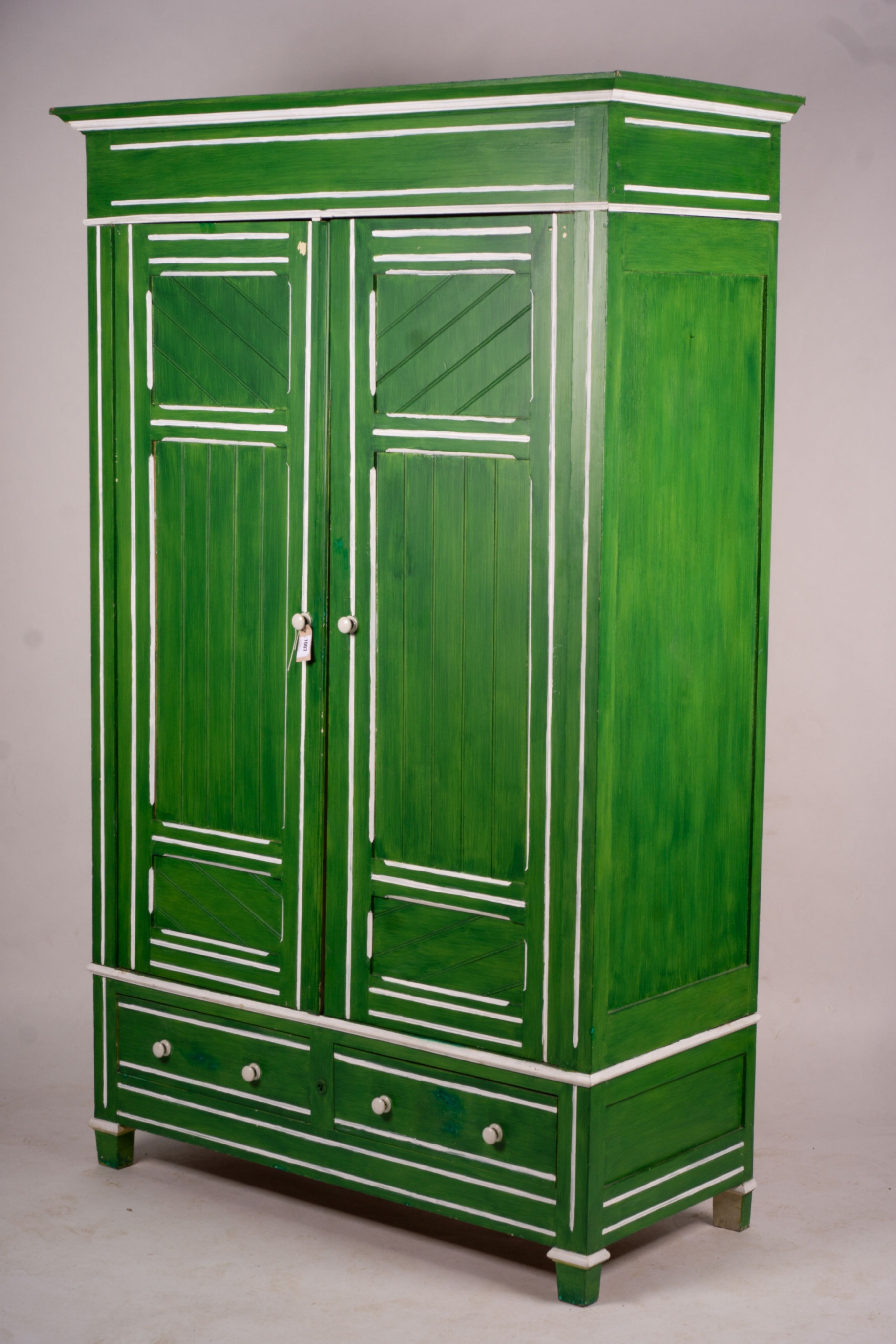 A late Victorian painted pine two door wardrobe, W.120cm H.212cm